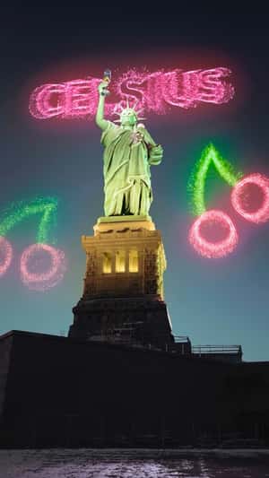 Statue of Liberty Drinks Energy Drink in a fake-out-of-home ad of CELSIUS Energy Drink
