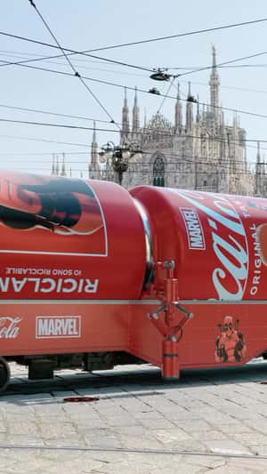 Deadpool-themed Cans on Tram in a fake-out-of-home ad of Coca-Cola