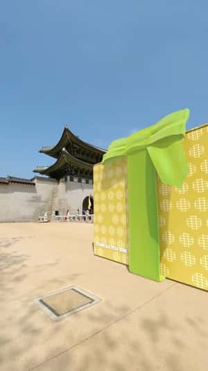 Gift Box Unfolds at Plaza in Korea in a fake-out-of-home ad of Crocs