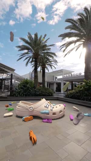 Clogs Rain Down at Shopping Center in a fake-out-of-home ad of Clogs