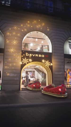 Sled Cars Loaded with Gifts in a fake-out-of-home ad of Devred