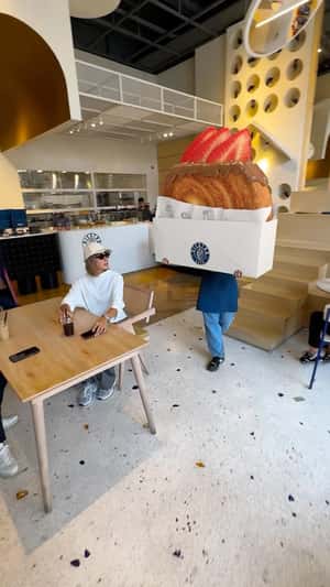Massive Pastry Placed on Table in a fake-out-of-home ad of Diestro Cafe