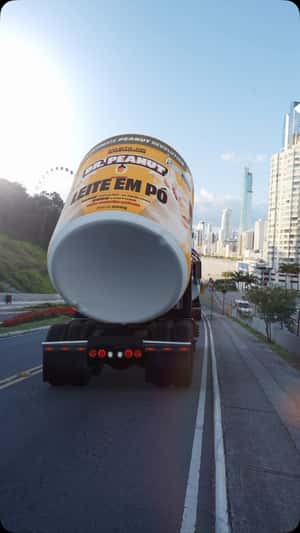 Containers Transported by Trucks in a fake-out-of-home ad of DR. PEANUT