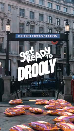 Chocolate Bars Erupts at Subway Entrance in a fake-out-of-home ad of Drooly