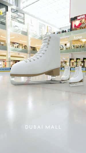 Ice Skates Glide on Rink in a fake-out-of-home ad of Dubai Mall