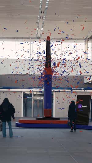 Confetti Swirling on Hair Styler in a fake-out-of-home ad of Dyson