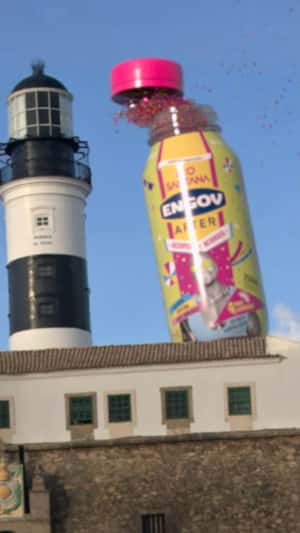 Bottle Tumbles Spilling Glitters in a fake-out-of-home ad of Engov