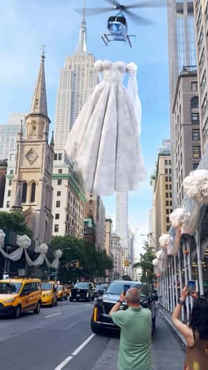 Bridal Gown Hangs from Helicopter in a fake-out-of-home ad of Eva Lendel