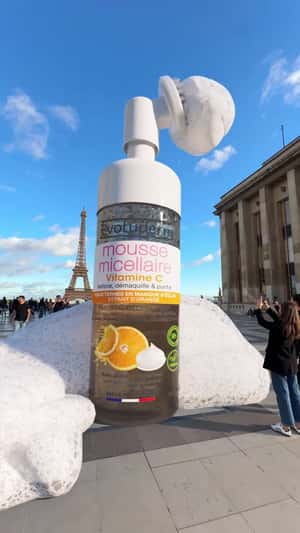 Cleanser Bottle Releases Foam in a fake-out-of-home ad of Evoluderm