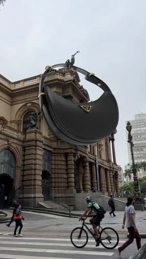 Handbag Hangs at Theatro Municipal in a fake-out-of-home ad of Farfetch