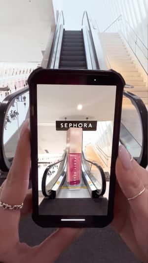 Beauty Products Visible on Phone in a fake-out-of-home ad of Sephora