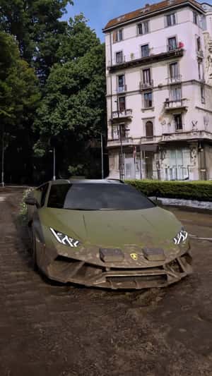 Sports Car Blooming Flowers on Dirt Road in fake-out-of-home ad of Lamborghini