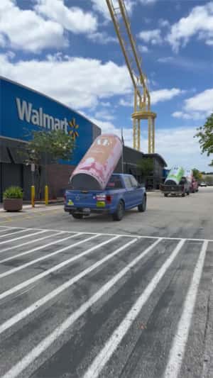 Cocktail Cans Loaded on Trucks in a fake-out-of-home ad of Free AF