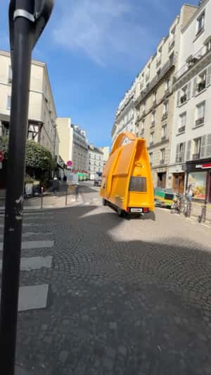 Rolling Bag in fake-out-of-home ad of Jacquemus
