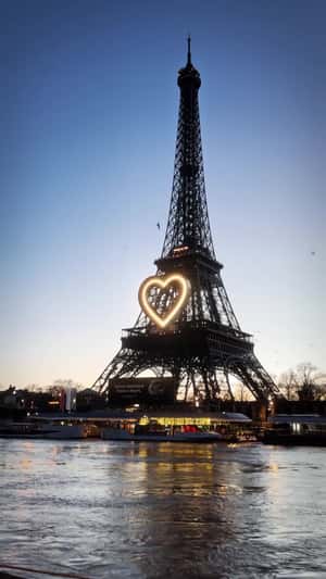 Heart Signage at Eiffel Tower in af fake-out-of--home ad of Girard-Perregaux