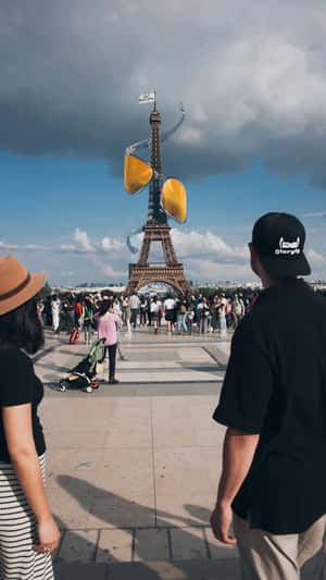 Sunglasses Spiraling at Eiffel Tower in a fake-out-of-home ad of Glorify Unbreakable
