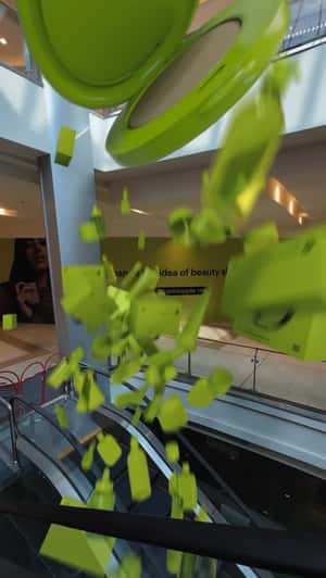 Beauty Products Floats at Shopping Mall in a fake-out-of-home ad of Gold Apple