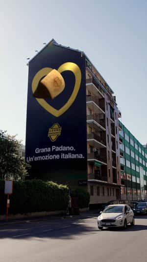 Cheese Turned into Soccer Ball in a fake-out-of-home ad of Grana Padano Cheese