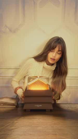 Serum Illuminates the Room in a fake-out-of-home ad of Guerlain