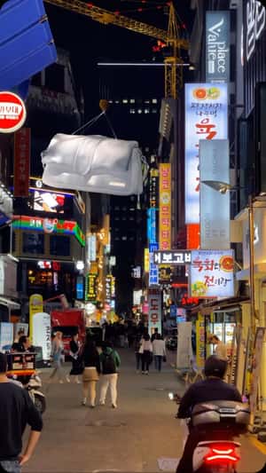 Bag Crane Installation in fake-out-of-home ad of Jacquemus