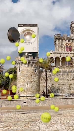 Washing Machine Spills Tennis Balls in a fake-out-of-home ad of Haier