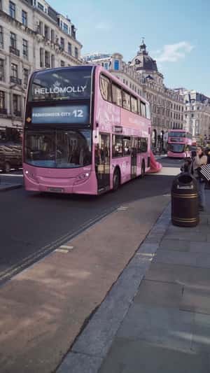 Pink Dress behind the Bus in a fake-out-of-home ad of Hello Molly