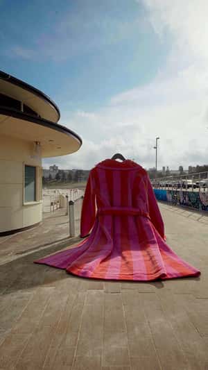 Robe on Hanger Walks the Street in a fake-out-of-home ad of Hommey
