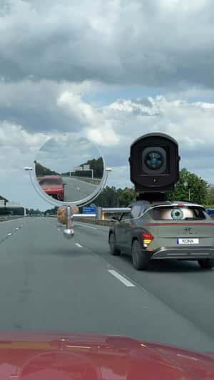 Surveillance Camera Mounted on Car in a fake-out-of-home ad of Hyundai