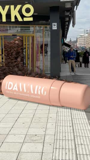 Cocoa Husks Spill Over in a fake-out-of-home ad of IDA WARG Beauty