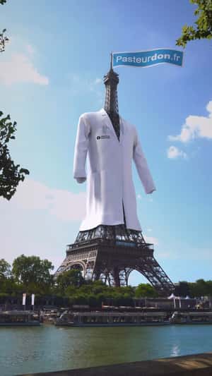 Eiffel Tower Wears Lab Coat in a fake-out-of-home ad of Institut Pasteur