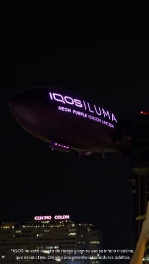 Tobacco Devices Emerges from Window Display in a fake-out-of-home ad of IQOS
