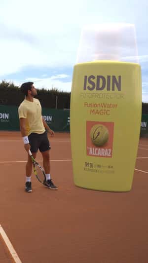 Sunscreen Bottle Lands at Tennis Court in a fake-out-of-home ad of ISDIN