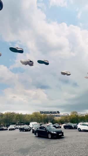 Flying Sneakers Spotted in a fake-out-of-home ad of JD Sports