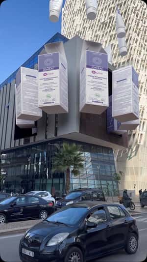 Skincare Packaging on Building in a fake-out-of-home ad of Eau Thermale Jonzac Maroc