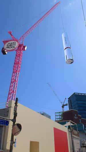 Lipstick Falls from Crane in a fake-out-of-home ad of JUNG SAEM MOOL