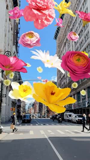Bubbles Burst into Flowers in a fake-out-of-home ad of Kate Spade