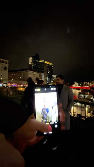 Red Drone Lights Form Logo in a fake-out-of-home ad of KFC