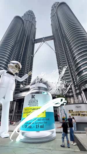 Serum Bottle Appears at Petronas Towers in a fake-out-of-home ad of Kiehl's