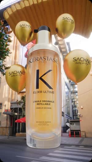 Hair Serum Lands by Parachute in a fake-out-of-home ad of Sachane