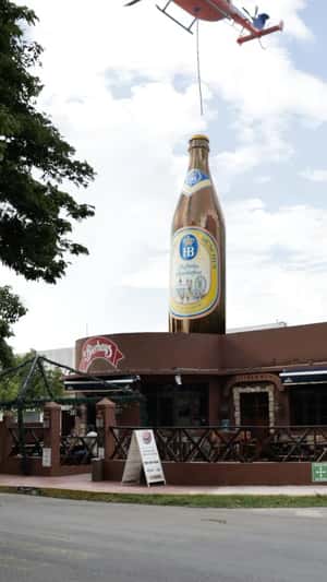 Helicopter Delivers Beer in a fake-out-of-home ad of La Bierhaus