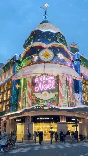 Santa's Workshop Built on Facade in a fake-out-of-home ad of Le BHV Marais