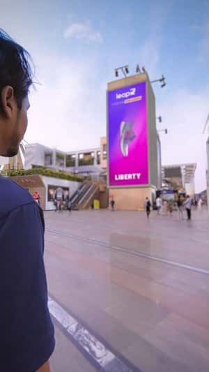Sneakers Spill Out of Digital Screen in a fake-out-of-home ad of Liberty Shoes