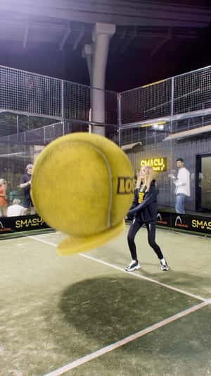 Players Launch Giant Tennis Ball in a fake-out-of-home ad of Locals