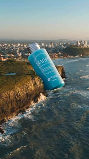 Serum Bottle Lands on the Coast in a fake-out-of-home ad of L'Occitane