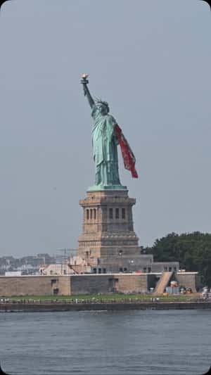 Scarf Draped on Liberty’s Arm in a fake-out-of-home ad of Magda Butrym