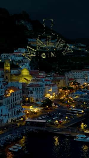 Drone Lights Create Gin Bottle in a fake-out-of-home ad of Malfy Gin