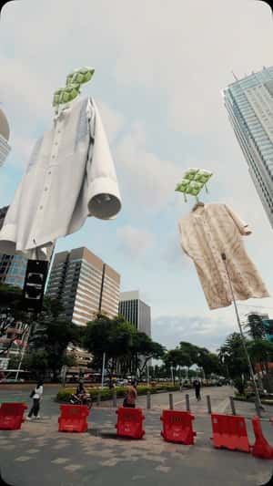 Shirts Hover Over Highway in a fake-out-of-home ad of Manzone