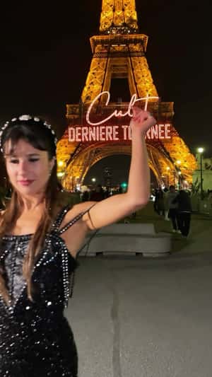 Neon Signage Glows at Eiffel Tower in a fake-out-of-home ad of Marie