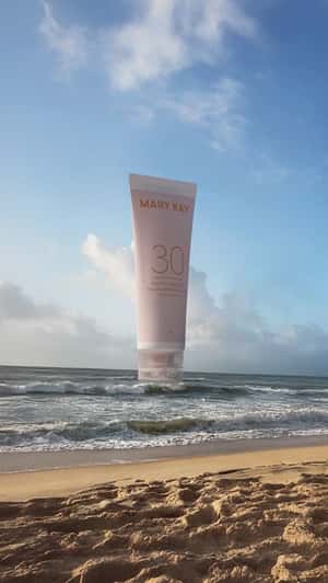 Sunscreen Inflates Above Ocean Waves in a fake-out-of-home ad of Mary Kay