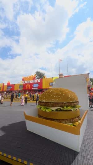 Burger Boxes Land on Festival Grounds in a fake-out-of-home ad of McDonald's